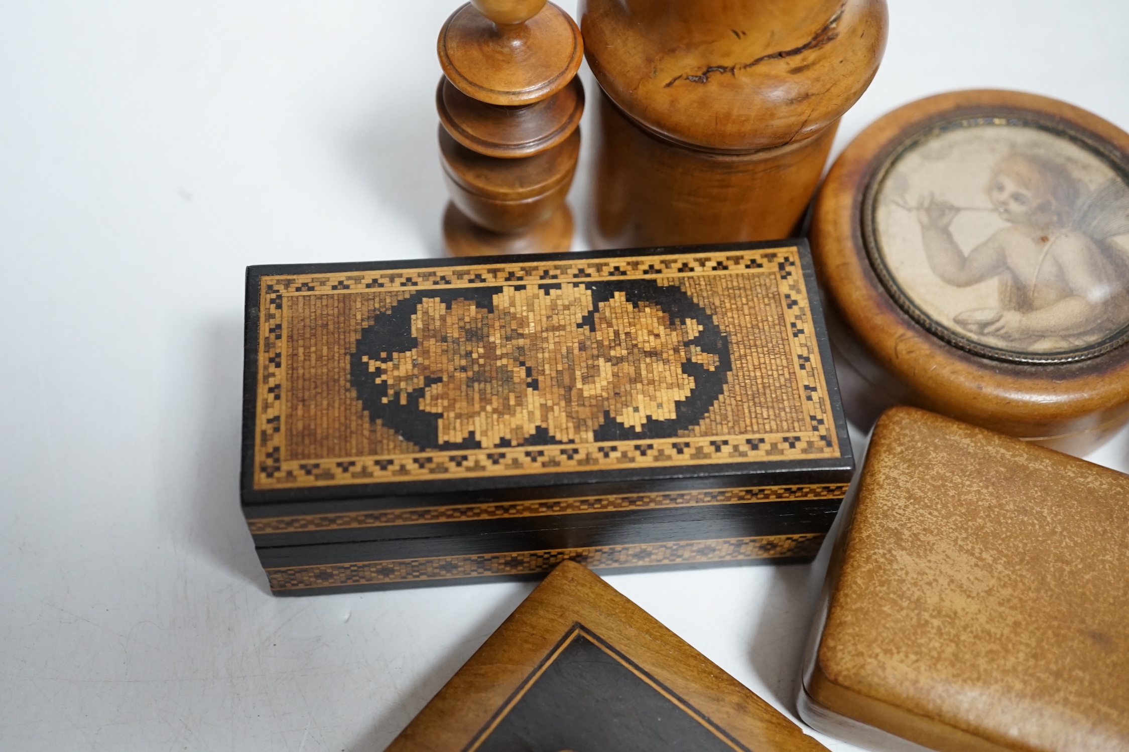 A mixed collection of small treen items and boxes to include a miniature dominos set, a Tunbridge ware ring box, etc.